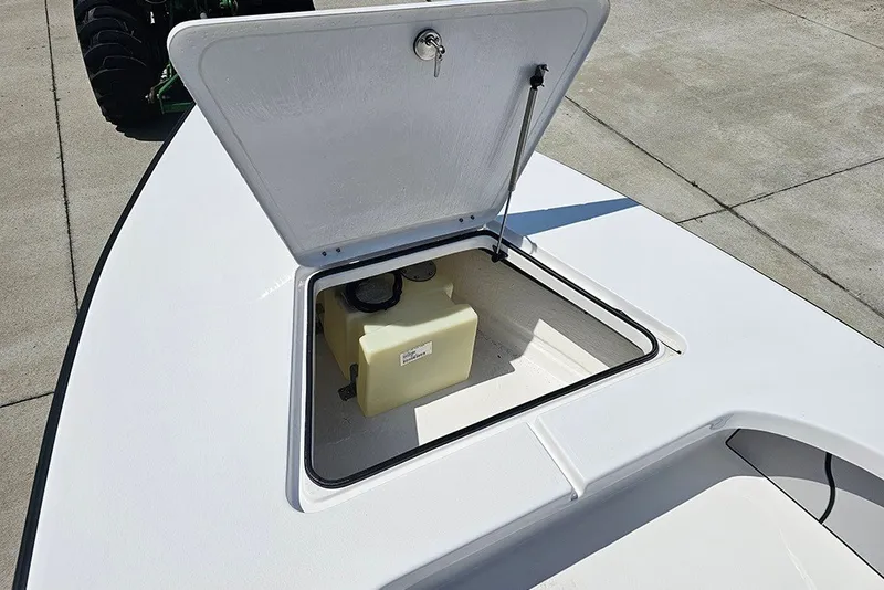 Slide: The Image of Open storage compartment on 2025 Delta Boatworks Delta D18 boat deck. - 18