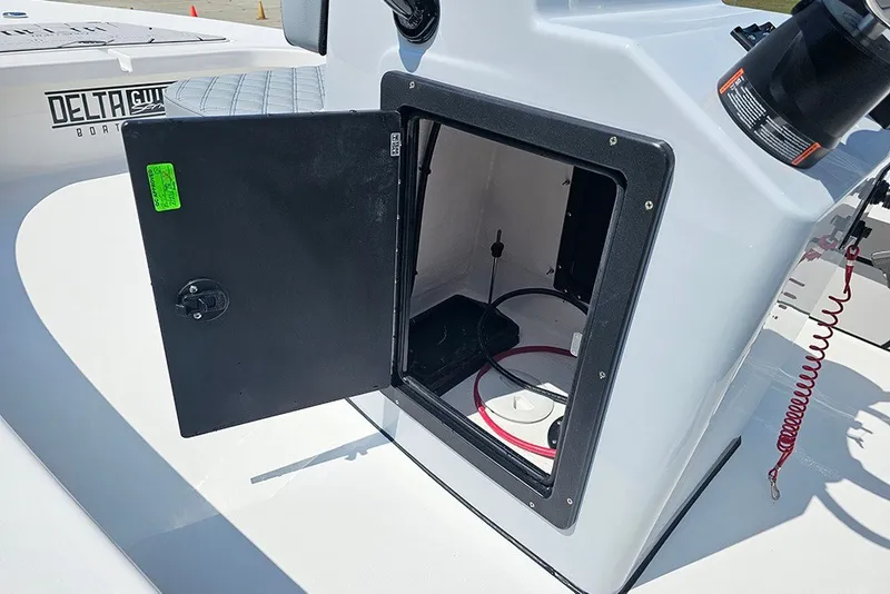 Slide: The Image of Open storage compartment on 2025 Delta Boatworks Delta D18 boat deck. - 15