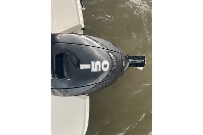 Slide: The Image of 2023 Bayliner VR6 Bowrider OB outboard motor on water. - 11