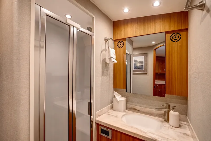 Slide: The Image of Luxurious bathroom in 2021 Viking 46 Billfish yacht with modern fixtures and elegant design. - 19