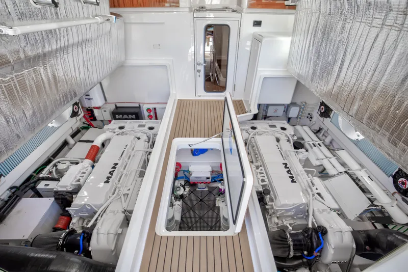 Slide: The Image of Engine room of 2021 Viking 46 Billfish yacht with MAN engines, showcasing advanced marine engineering. - 23