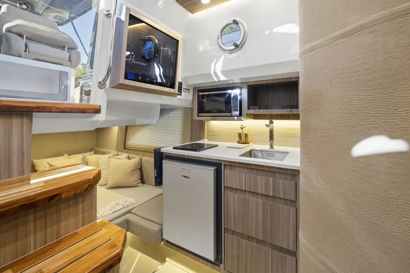 Slide: The Image of Luxurious Hanover 447 yacht interior with modern kitchen and cozy seating, 2026 model. - 47