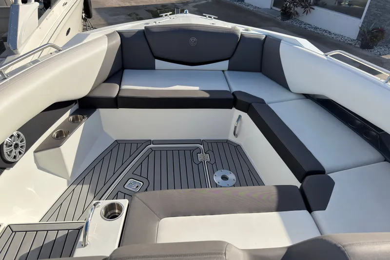 Slide: The Image of 2019 Cruisers Yachts 338 Outboard interior with sleek seating and modern design. - 24