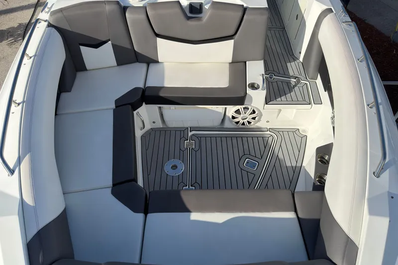 Slide: The Image of 2019 Cruisers Yachts 338 Outboard interior with sleek seating and modern design. - 25