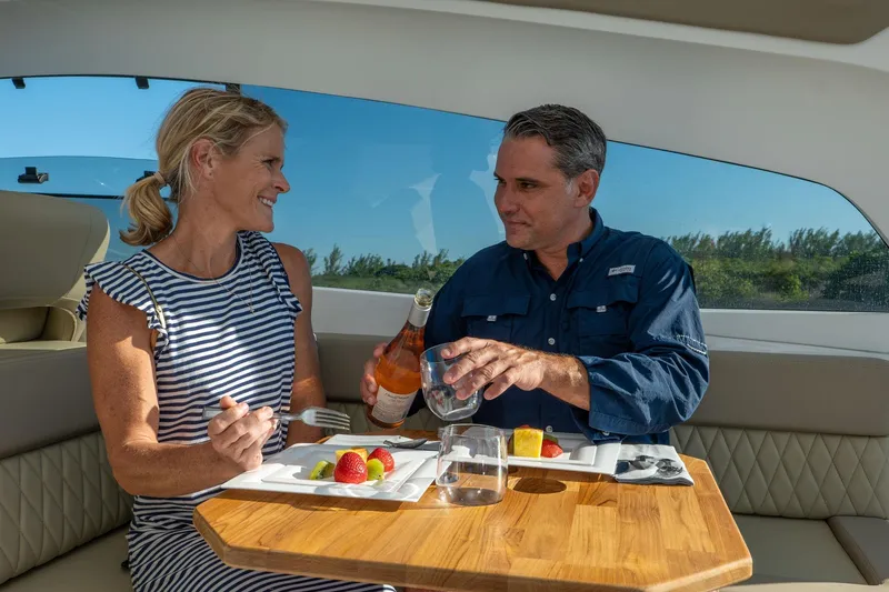 Slide: The Image of Couple enjoying a meal on a Hanover 375 yacht, 2026 model. - 38