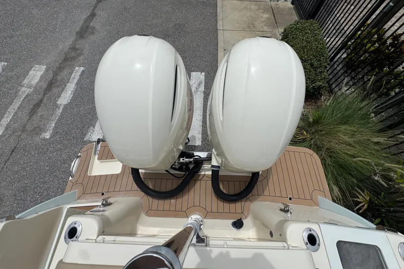 Slide: The Image of 2022 Scout 277 Dorado boat with dual outboard motors, viewed from above. - 32