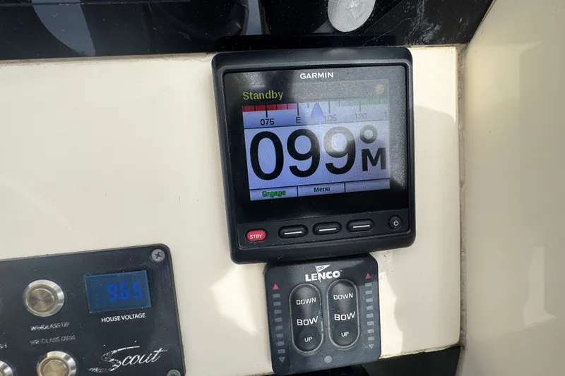 Slide: The Image of Garmin display on 2022 Scout 277 Dorado boat showing navigation data. - 28