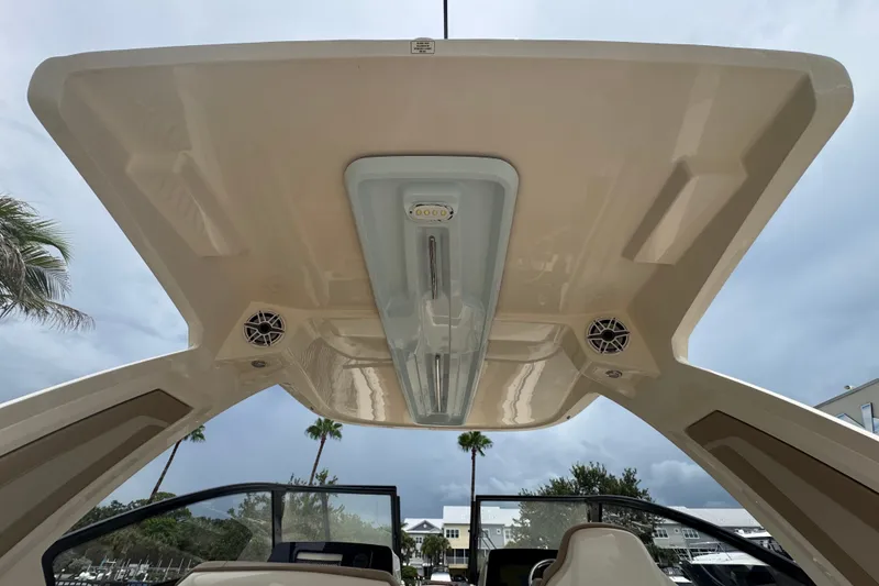 Slide: The Image of 2022 Scout 277 Dorado boat interior roof with speakers and lighting. - 30