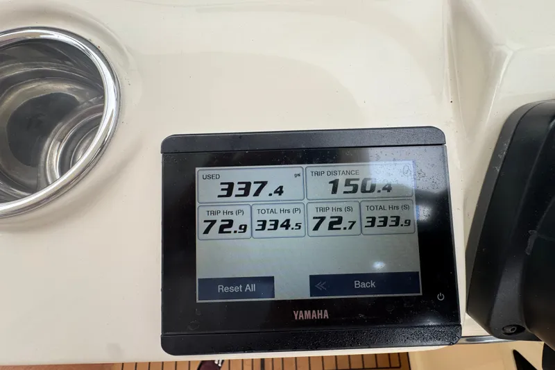Slide: The Image of Yamaha display on 2022 Scout 277 Dorado showing trip data and fuel usage. - 27