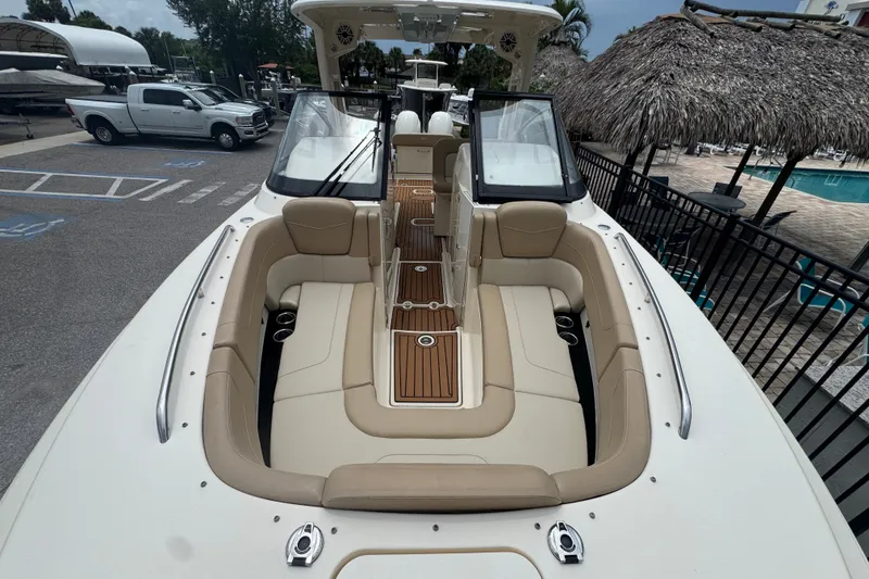 Slide: The Image of 2022 Scout 277 Dorado boat with spacious seating and sleek design. - 14