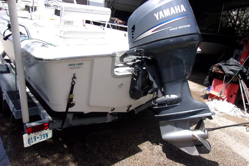 Slide: The Image of 2004 Sea Pro SV1900CC Bay Boat with Yamaha outboard motor on trailer. - 4