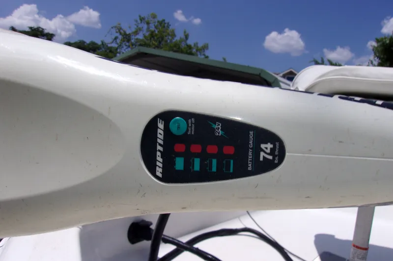 Slide: The Image of Close-up of a 2004 Sea Pro SV1900CC Bay Boat's Riptide battery gauge. - 14
