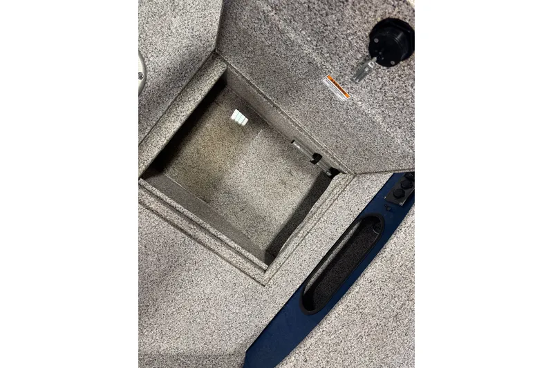 Slide: The Image of Interior storage compartment of 2023 Polar Kraft Outlander 2010 WT boat. - 16