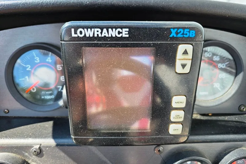 Slide: The Image of Lowrance X25B fish finder on 1997 Cajun 1700 Fish and Ski dashboard. - 17
