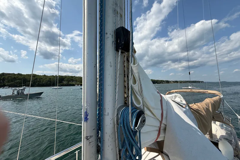 Slide: The Image of Sailboat mast and rigging on 1994 Pacific Seacraft Crealock 37, with scenic water view. - 63