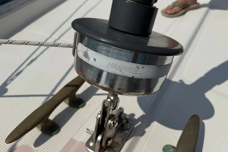 Slide: The Image of Close-up of a Harken winch on a 1994 Pacific Seacraft Crealock 37 sailboat deck. - 54