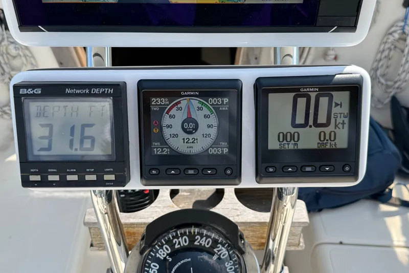 Slide: The Image of Sailing instruments on a 1994 Pacific Seacraft Crealock 37, displaying depth and navigation data. - 73