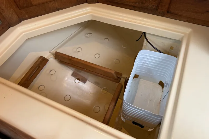Slide: The Image of Interior storage compartment of a 1994 Pacific Seacraft Crealock 37 sailboat. - 33