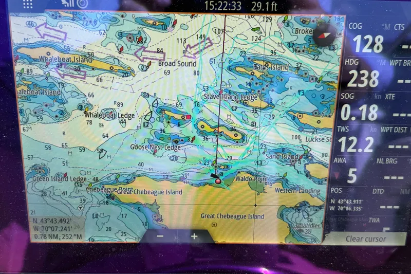 Slide: The Image of Navigation display on a 1994 Pacific Seacraft Crealock 37, showing nautical chart and sailing data. - 74