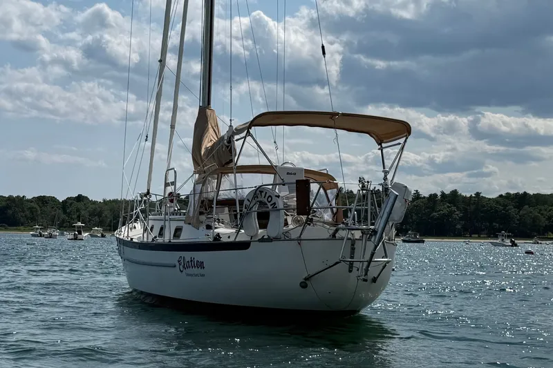 Slide: The Image of Sailboat "Elation," a 1994 Pacific Seacraft Crealock 37, anchored on a sunny day. - 8
