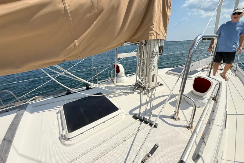 Slide: The Image of 1994 Pacific Seacraft Crealock 37 sailboat deck with rigging and ocean view. - 64