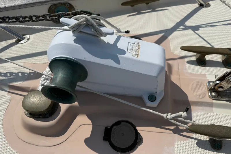 Slide: The Image of Deck of 1994 Pacific Seacraft Crealock 37 with anchor windlass and cleats. - 55