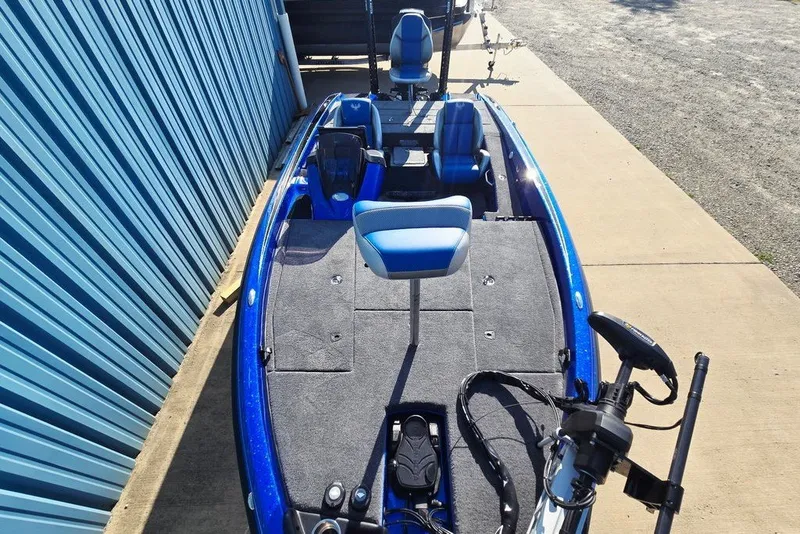 Slide: The Image of 2026 Phoenix 818 Pro fishing boat with blue seats and advanced controls. - 19
