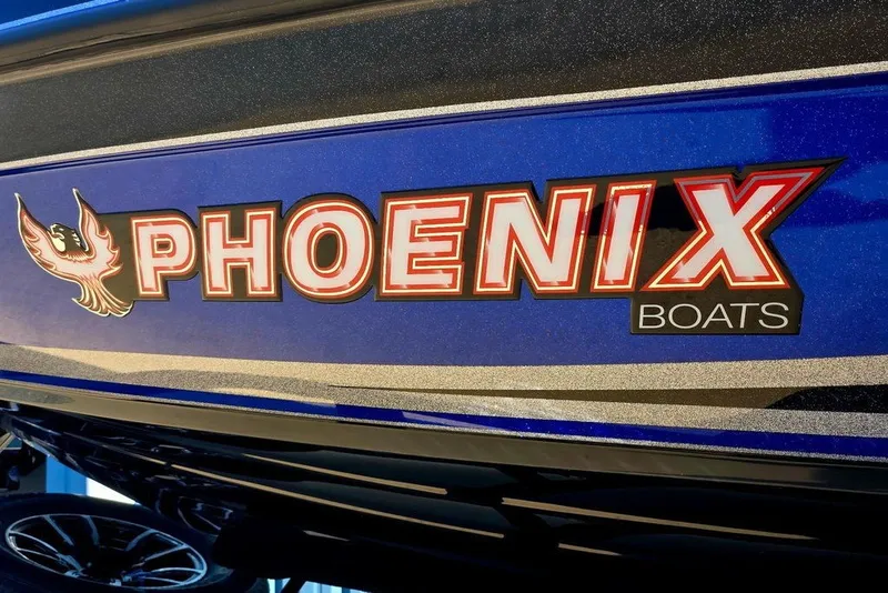 Slide: The Image of Phoenix 818 Pro 2026 boat logo on blue hull. - 25