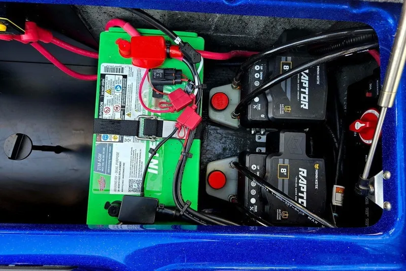 Slide: The Image of Battery compartment of 2026 Phoenix 818 Pro with Raptor and Interstate batteries. - 64