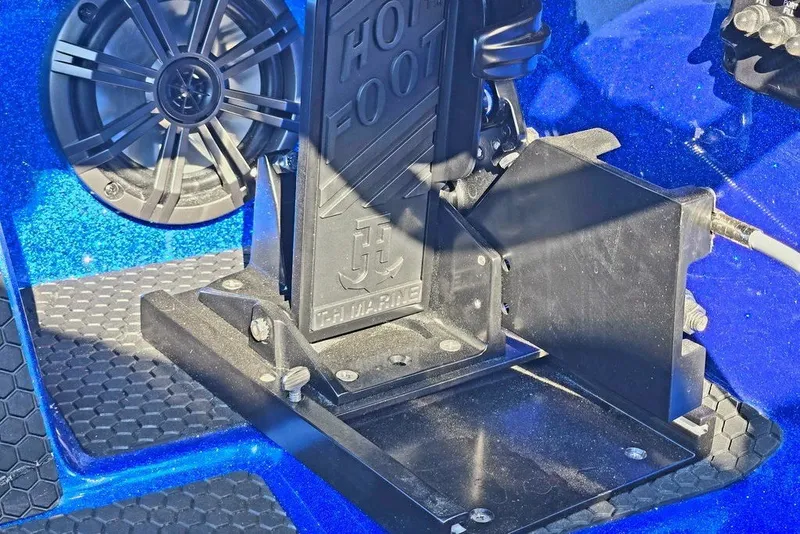 Slide: The Image of Foot pedal and speaker in 2026 Phoenix 818 Pro boat, blue interior. - 49
