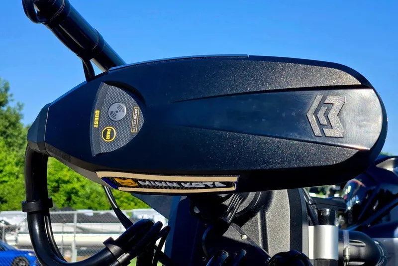 Slide: The Image of Close-up of 2026 Phoenix 818 Pro motorcycle handlebar with control panel and logo. - 18