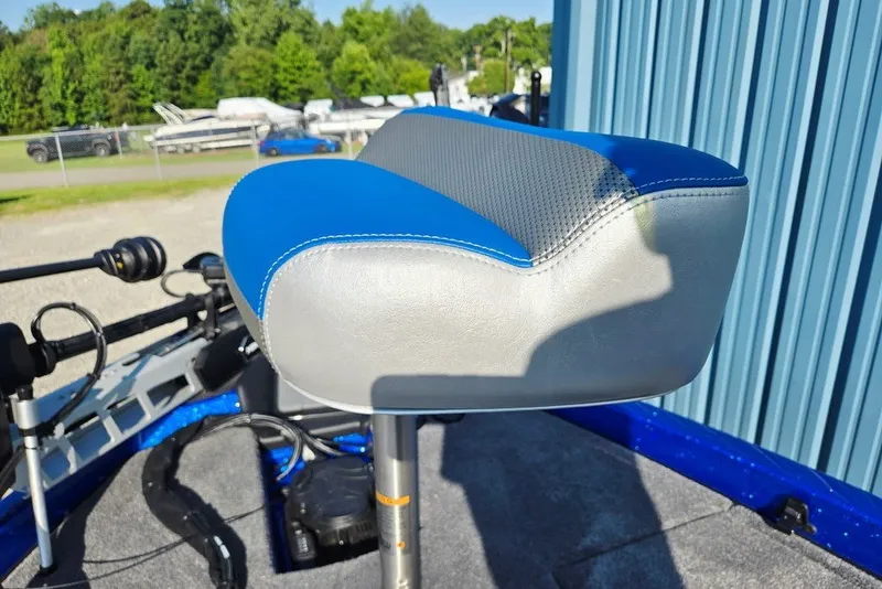 Slide: The Image of Blue and gray seat on a 2026 Phoenix 818 Pro boat, outdoors. - 21