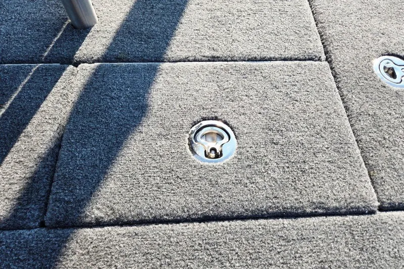 Slide: The Image of Carpeted boat deck with metal fixtures, Phoenix 818 Pro, 2026 model. - 61
