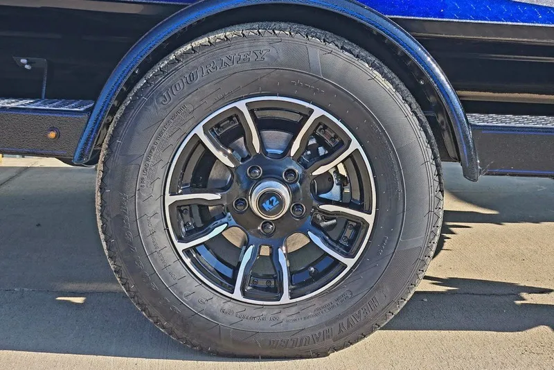 Slide: The Image of 2026 Phoenix 818 Pro wheel with black alloy rim and Journey tire. - 9
