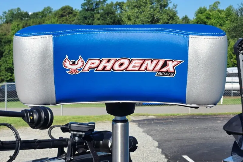 Slide: The Image of Blue and silver seat with Phoenix Boats logo, 2026 Phoenix 818 Pro model. - 17