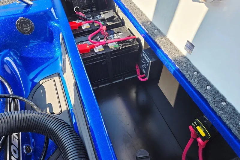 Slide: The Image of Battery compartment of 2026 Phoenix 818 Pro boat with wiring and components. - 68