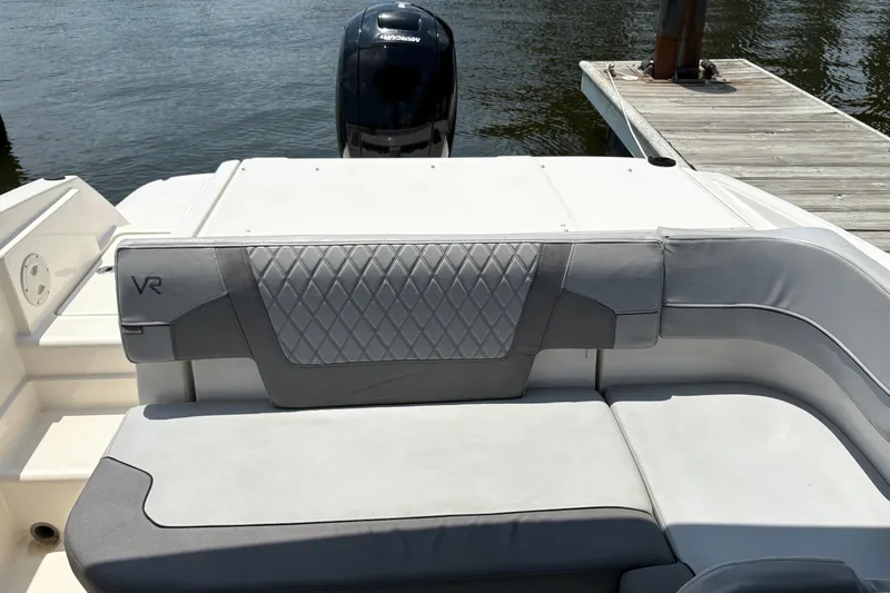 Slide: The Image of 2023 Bayliner VR6 Bowrider OB with sleek seating and Mercury outboard engine. - 7