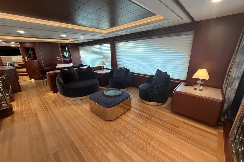 Slide: The Image of Luxurious interior of 2008 Azimut 95 yacht with elegant seating and wooden flooring. - 40