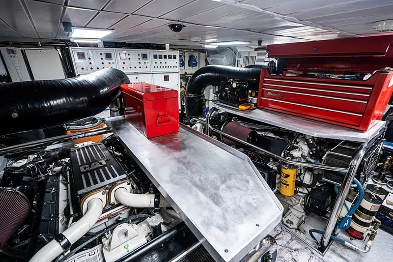 Slide: The Image of Engine room of a 2008 Azimut 95 yacht with tools and machinery. - 34