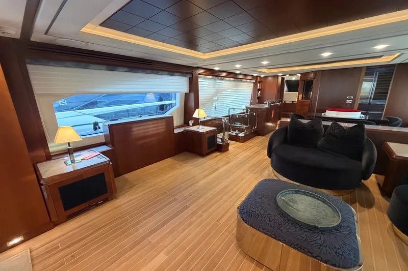 Slide: The Image of Luxurious interior of 2008 Azimut 95 yacht with elegant wood finishes and modern furnishings. - 41