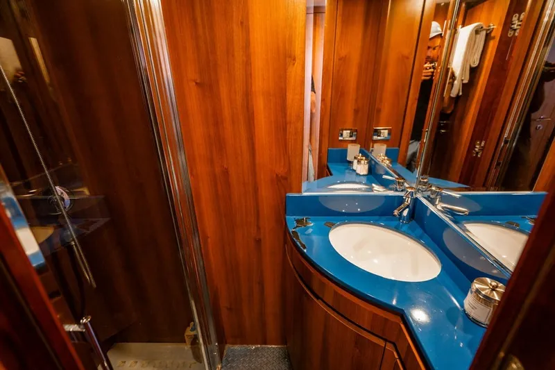 Slide: The Image of Luxurious bathroom with blue countertop in 2008 Azimut 95 yacht. - 23