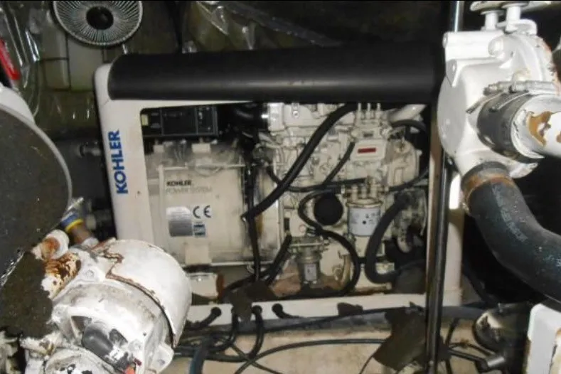 Slide: The Image of Engine room of a 1997 Riviera 34 Convertible with Kohler power system. - 47