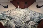 Slide: The Image of Interior cabin of a 1978 Hatteras 43 Double Cabin yacht with camouflage bedding. - 13