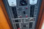 Slide: The Image of Electrical panel of a 1978 Hatteras 43 Double Cabin boat with gauges and switches. - 10
