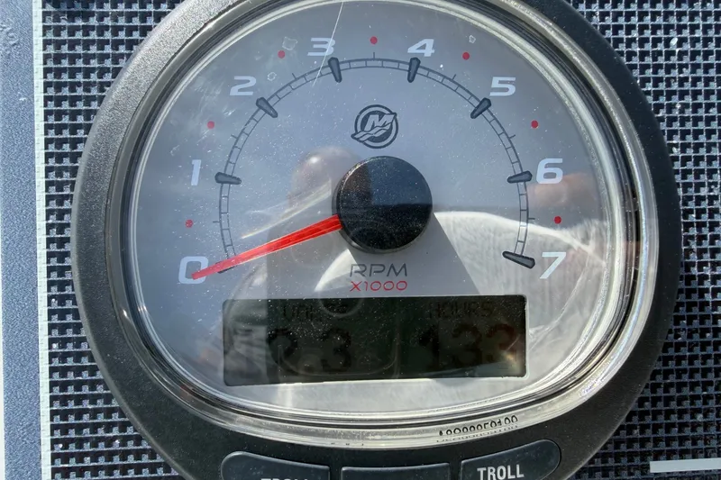 Slide: The Image of Tachometer of 2022 Boston Whaler 170 Montauk showing RPM and hours. - 13
