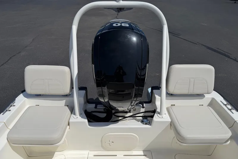 Slide: The Image of 2022 Boston Whaler 170 Montauk boat with dual seats and outboard motor. - 10