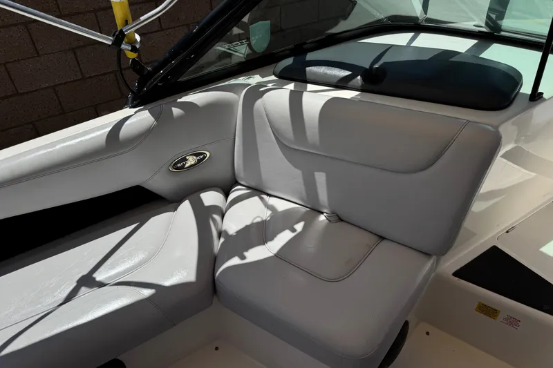 Slide: The Image of 2003 Centurion Cyclone C4 boat interior with gray seating and sleek design. - 24