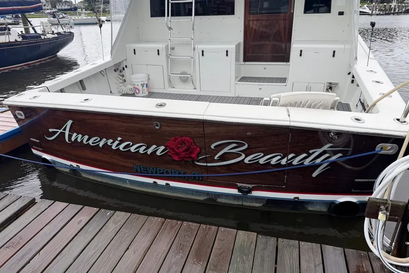 Slide: The Image of Luxury yacht "American Beauty" docked, featuring elegant lettering and rose design, Newport, RI. - 2