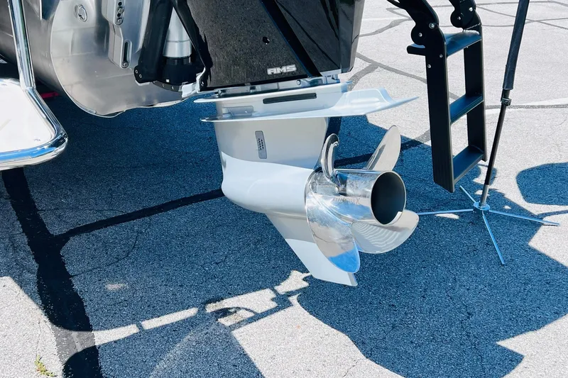 Slide: The Image of Propeller and motor of 2027 Harris Grand Mariner 250 SL boat on pavement. - 39
