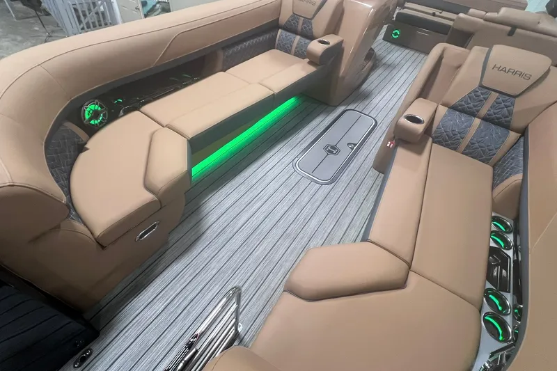 Slide: The Image of Luxurious interior of 2027 Harris Grand Mariner 250 SL with ambient lighting and plush seating. - 60